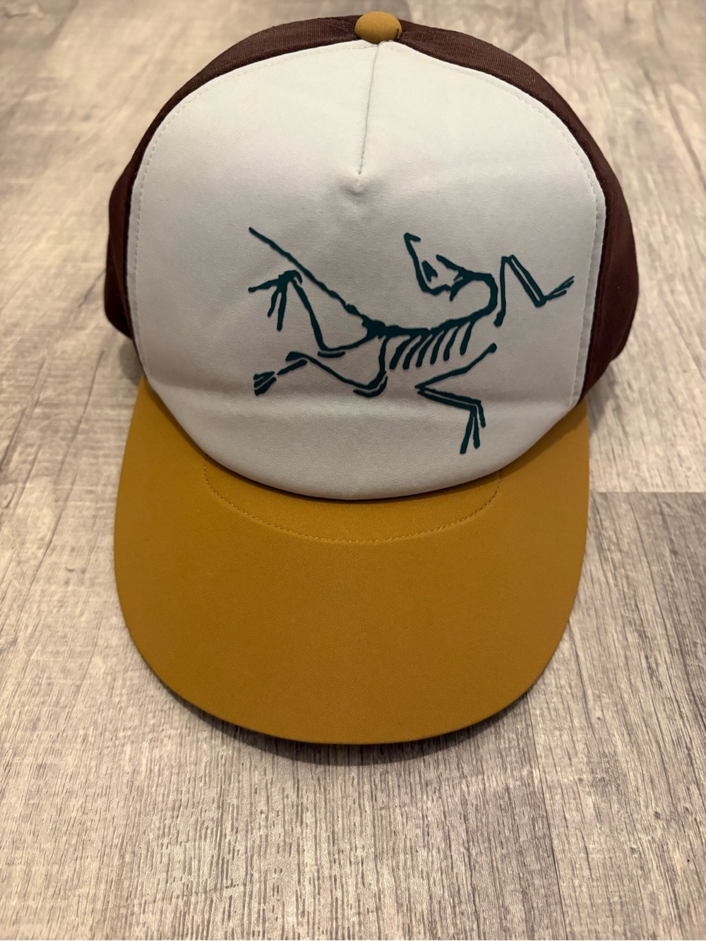 Arc’teryx Bird Trucker Hat Brown Mustard Yellow White Panel Skeleton Embroidery